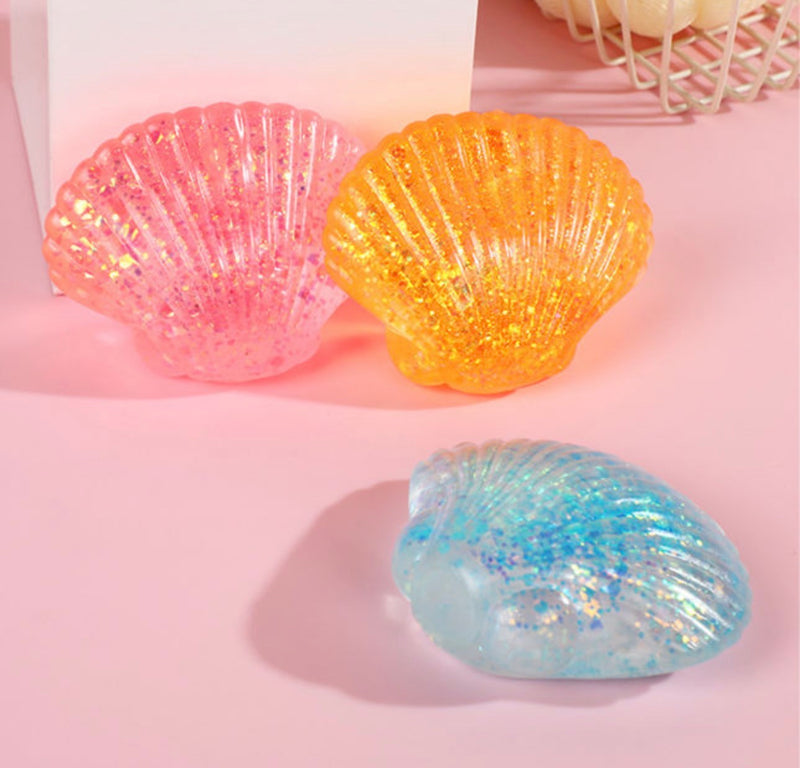 Viral Squeeze Squishy Glitter Shell – Rockin The Lace Boutique